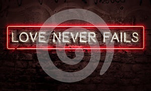Love Never Fails Neon Inspirational Sign photo