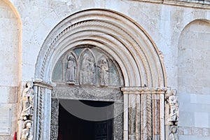 Christian Sculptures on Portal of Cathedral of St. Anastasia in Zadar City, Croatia photo