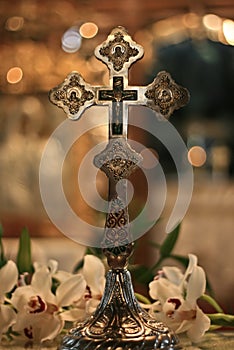 Christian silver cross in church