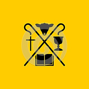 Christian symbols. The Bible, the cross of Jesus Christ, the sacrificial lamb and the cup of communion