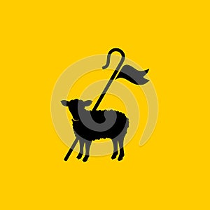 Christian symbols. Shepherd`s staff and sacrificial lamb photo