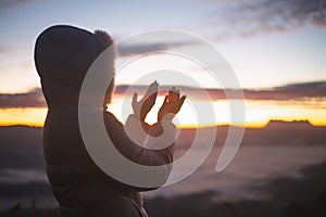 Christian woman hands praying to god Woman Pray for god blessing to wishing have a better life. begging for forgiveness and