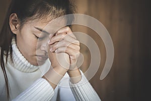 Christian woman  hands praying to god  Woman Pray for god blessing to wishing have a better life. begging for forgiveness and