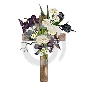 Christian wooden cross decorated with flowers and leaves