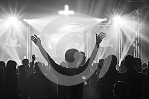 Christian worship God together in Church ,raised hand and praise the lord