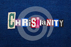 CHRISTIANITY word text collage, multi colored fabric on blue denim, Christianity religion diversity concept