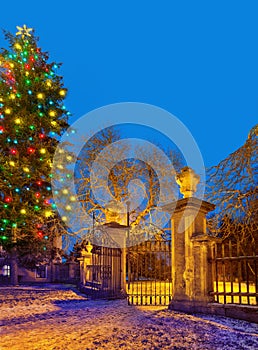 Christma tree with old gateway , Town of postoloprty, Czech Rep