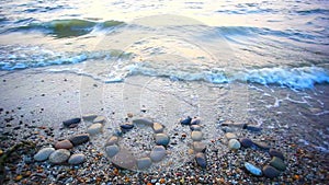 Christmas 2015 made of small stones on the sandy