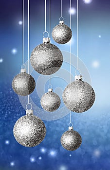 Christmas abstract background with blue glistening balls