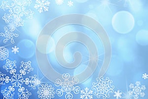 Christmas abstract winter shiny snow bokeh background with unique snowflakes