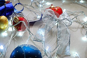 Christmas abstract set of ornaments and lights on neutral background.