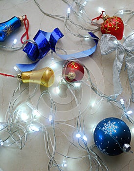Christmas abstract set of ornaments and lights on neutral background.