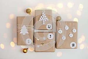 Christmas Advent calendar. Gift boxes with numbers on a light background. Winter holidays. DIY and hobbi concept photo