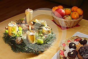 Christmas advent wreath with burning candles