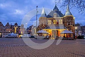 Christmas in Amsterdam at the Nieuwmarkt with the Waag building in Amsterdam at sunset