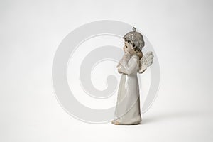 Christmas angel on white background. Little angel firuge isolated at white background