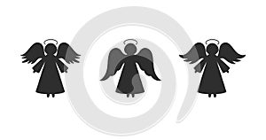 Christmas angels silhouettes. Isolated on white. Vector