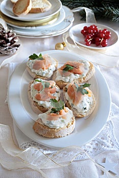 Christmas appetizer, smoked salmon and cream cheese canapés.