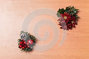 Christmas arrangement good night flower, apple and cherries bouquet on wooden textured background