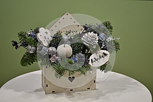 A winter bouquet. New year decoration. Gift flower for Christmas. Table Christmas arrangement.