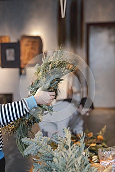 The Christmas atmosphere is alive and well in the flower and holiday decor shop.