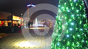Christmas atmosphere in night city, happy couples enjoying dates, time lapse