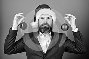 Christmas atmosphere spread around. Holidays meant for fun. Man bearded wear formal suit and santa hat. Businessman join