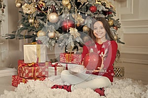 Christmas attributes decor. My perfect winter vacations. Little girl near christmas tree. Child celebrate christmas at