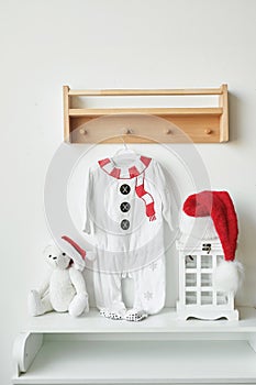 Christmas babies clothing. Childrens santa costume. Christmas greeting card background