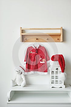 Christmas babies clothing. Childrens santa costume. Christmas greeting card background
