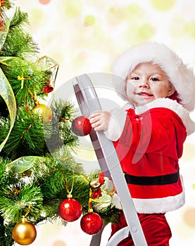 Christmas baby on a step ladder
