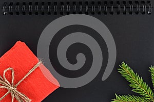 Christmas background on a black notepad sheet