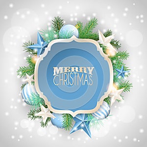 Christmas background with blue ornaments and branches