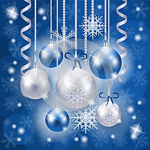 Christmas background in blue and silver on snowflakes background