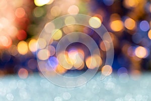 Christmas background with blue, yellow and white bokeh