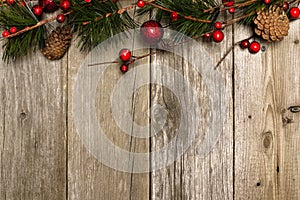 Christmas background of branches on wood