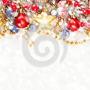 Christmas background with bright colorful decoration. Beautiful Christmas composition on snow background