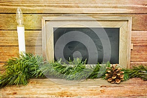 Christmas Background with candle on wood