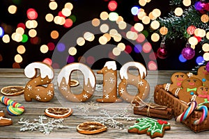 Christmas background with Christmas cookies, decoration and spices, 2018