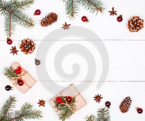 Christmas background with Christmas gift, fir branches, pine con