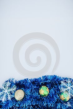 Christmas background. Christmas tinsel on a white background