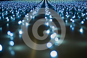 Christmas background - close up of blue and white garland lights with bokeh effect