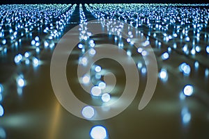 Christmas background - close up of blue and white garland lights with bokeh effect