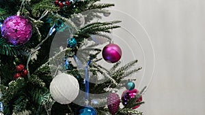 Christmas background. Close-up of decorations and balls on the New Year tree. Free space.