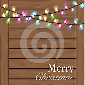 Christmas background with colorful light. Planked wood background