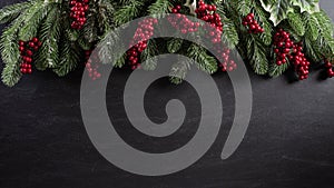 Christmas background concept. Top view of Christmas gift box red balls with spruce branches, pine cones, red berries and bell on