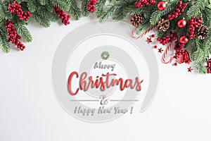 Christmas background concept. Top view of Christmas gift box red balls with spruce branches, pine cones, red berries and bell on