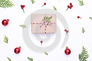 Christmas background concept. Top view of Christmas gift box red sock with spruce branches, pine cones, red berries