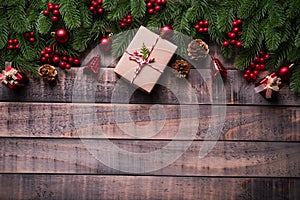 Christmas background concept. Top view of Christmas gift box red sock with spruce branches, pine cones, red berries