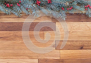 Christmas background with conifer decorated with red barry